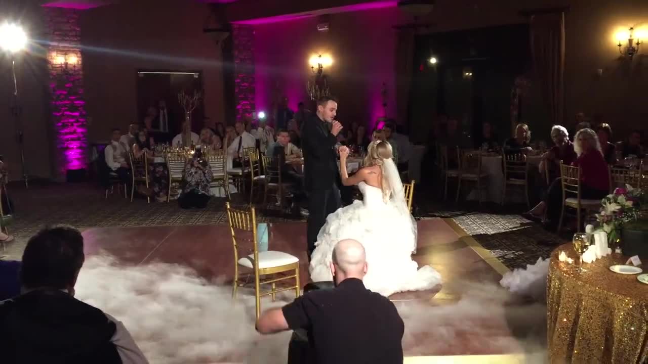 Groom delivers surprise original song after first dance