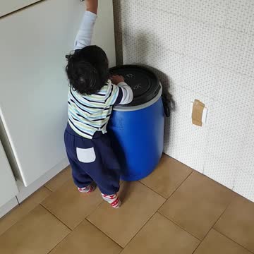 My little kid is trying to move the drum funny video