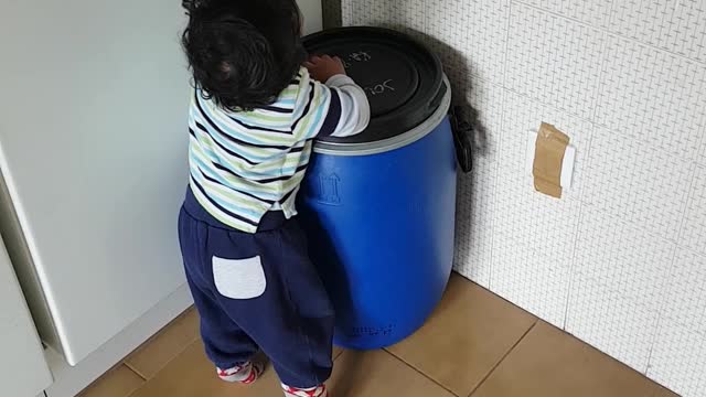 My little kid is trying to move the drum funny video