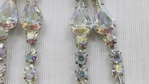 Silver Plated 2.5” Drop Earrings. Made with Swarovski Crystal AB. Post Earrings