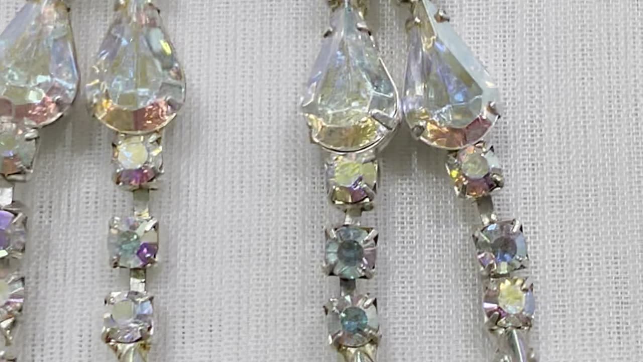 Silver Plated 2.5” Drop Earrings. Made with Swarovski Crystal AB. Post Earrings