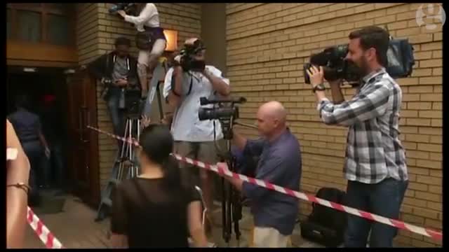 Oscar Pistorius enters court for bail hearing in Pretoria