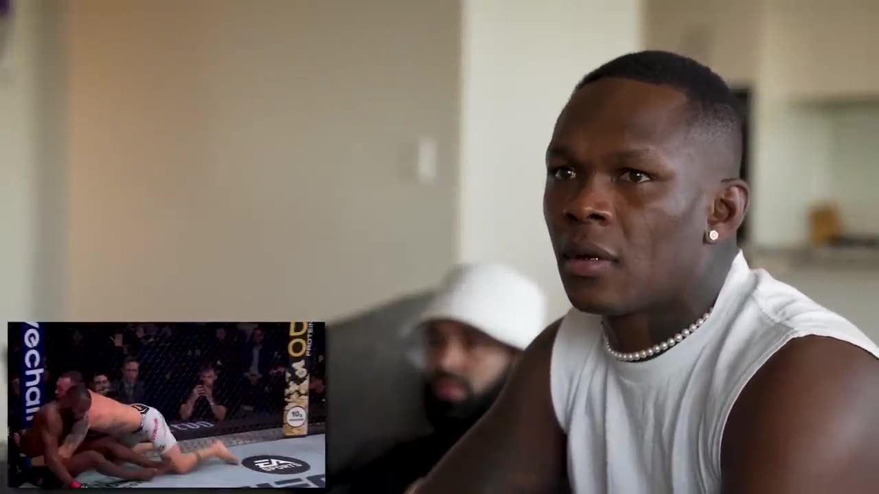 Israel Adesanya Reacts to WILD UFC 296 PPV & Sean vs Dricus Fighting in the Crowd