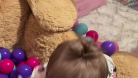 Adorable cute baby playing with her balls . so lovely!