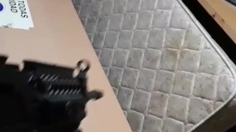 Shooting fake gun at man falls off bed