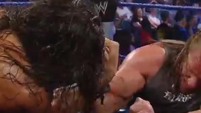 Great Khali arm wrestles Triple H