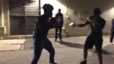 2 Kids Boxing At Park