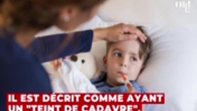 Livide et terrassé de fatigue _ un petit garçon de 9 ans atteint du covid-19, il.