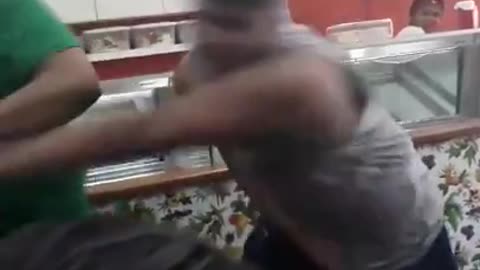 Batman ends heavy fight in a cafeteria in Brazil