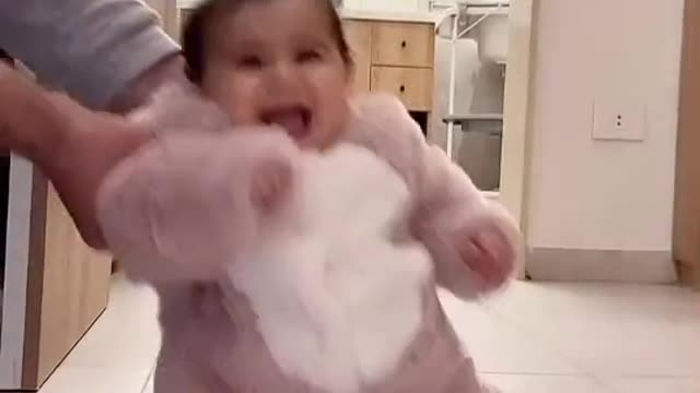 cute baby dancing in bunny costume