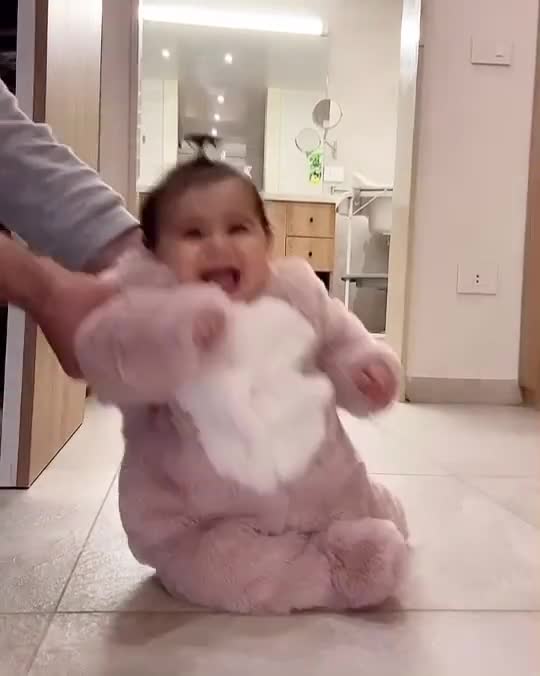 cute baby dancing in bunny costume
