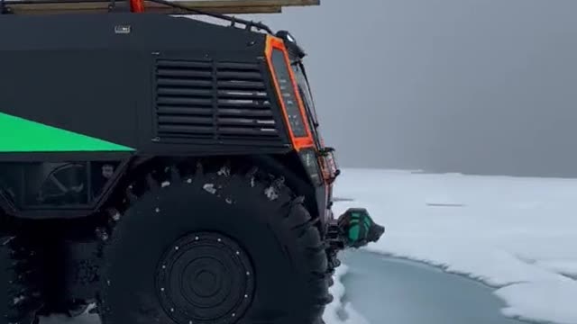 Driving anti-skid tires in snow, snowmobile display