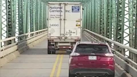 Greedy Truck Takes up Whole Bridge