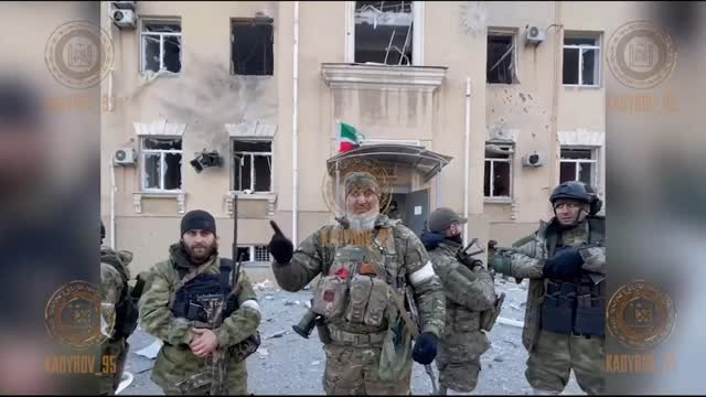 BADASS CHECHENS hoisting the flag over the administration building in Mariupol
