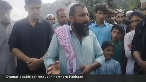8 rescued from dangling cable car in Pakistan