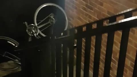 Helmet guy tries to ride black bike down stairs headbutts wall