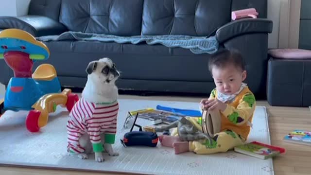 Lovely playing baby and puppy😍😍😍