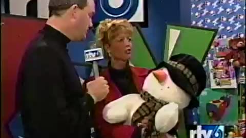 December 3, 2001 - WIBC's Terri Stacy and Jeff Pigeon Assist Toy Drive