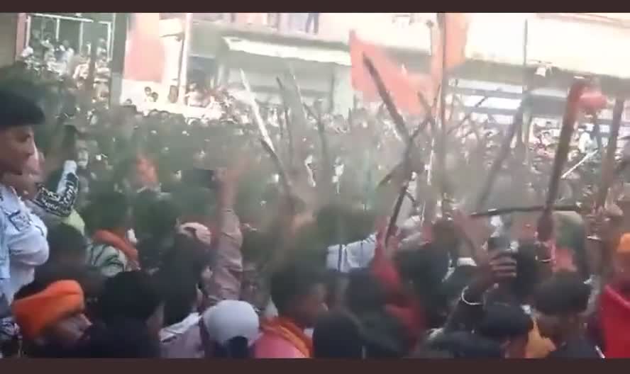 India Hindu radicals with swords, axe in front of a mosque