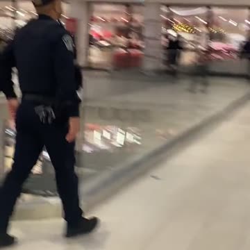 Austin police officers working a developing incident at Barton Creek Mall for reports of a robbery.