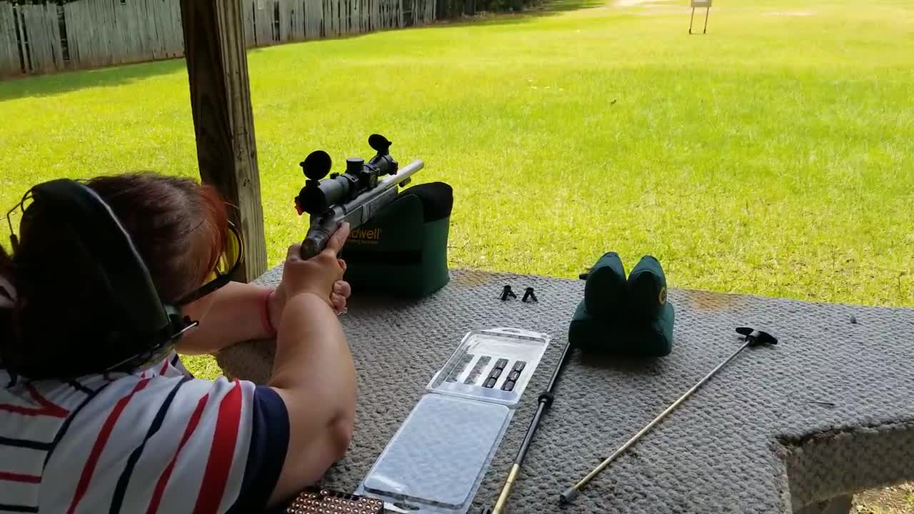 Laura loading and shooting 50 Caliber ML Pistol by area318.com