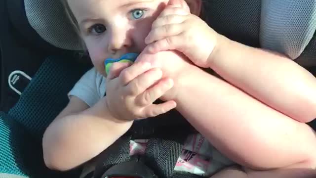 Toddler thinks her foot is a phone