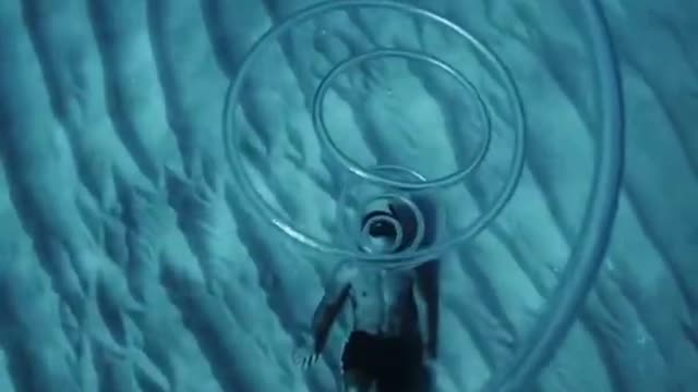 Blowing_a_bubble_rings_underwater___How_cool_is_this__