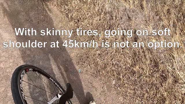 Oncoming truck dangerously squeezes between cyclist and car at high speed 2