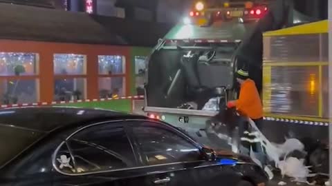 Throwing Garbage Bags Into Trucks Comes Easy to NYC Sanitation Worker