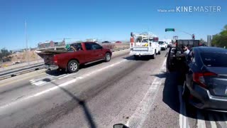 Driver Throws Bottle at Motorbike Rider