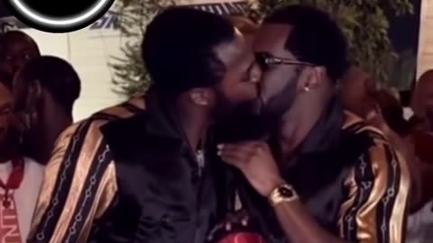 Meek Mill kissing Diddy