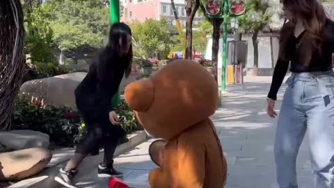 Before the brown bear could run, he fell down because of teasing the girl in episode 131