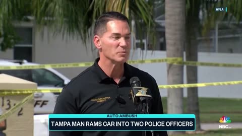 Video shows moment Tampa man appears to crash car into two police officers