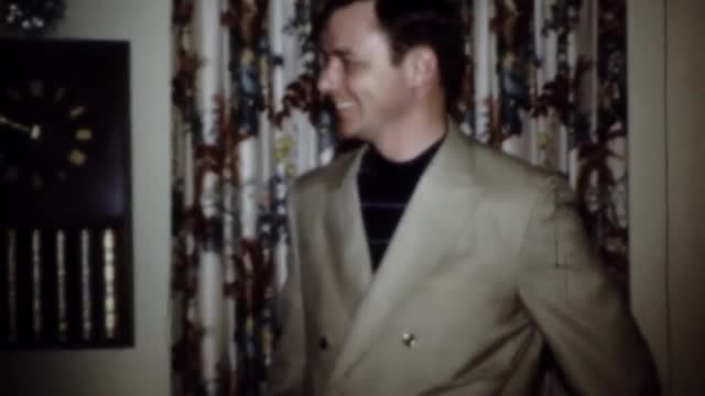 Kevin tries on a new suit