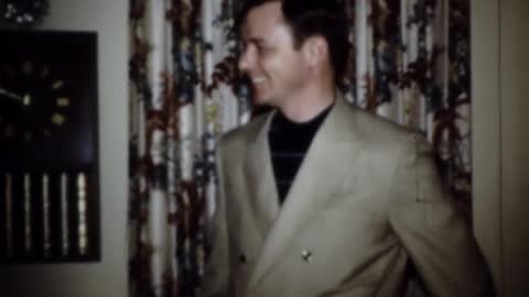 Kevin tries on a new suit