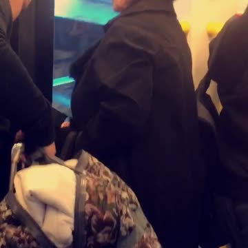 Lady subway night time crazy hair mohawk