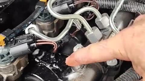 A gadget that malfunctions inside a car engine