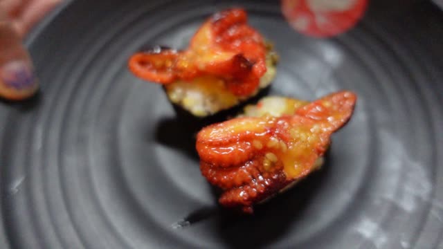 Baby Octopus Sushi Slow Motion Close Up Shot