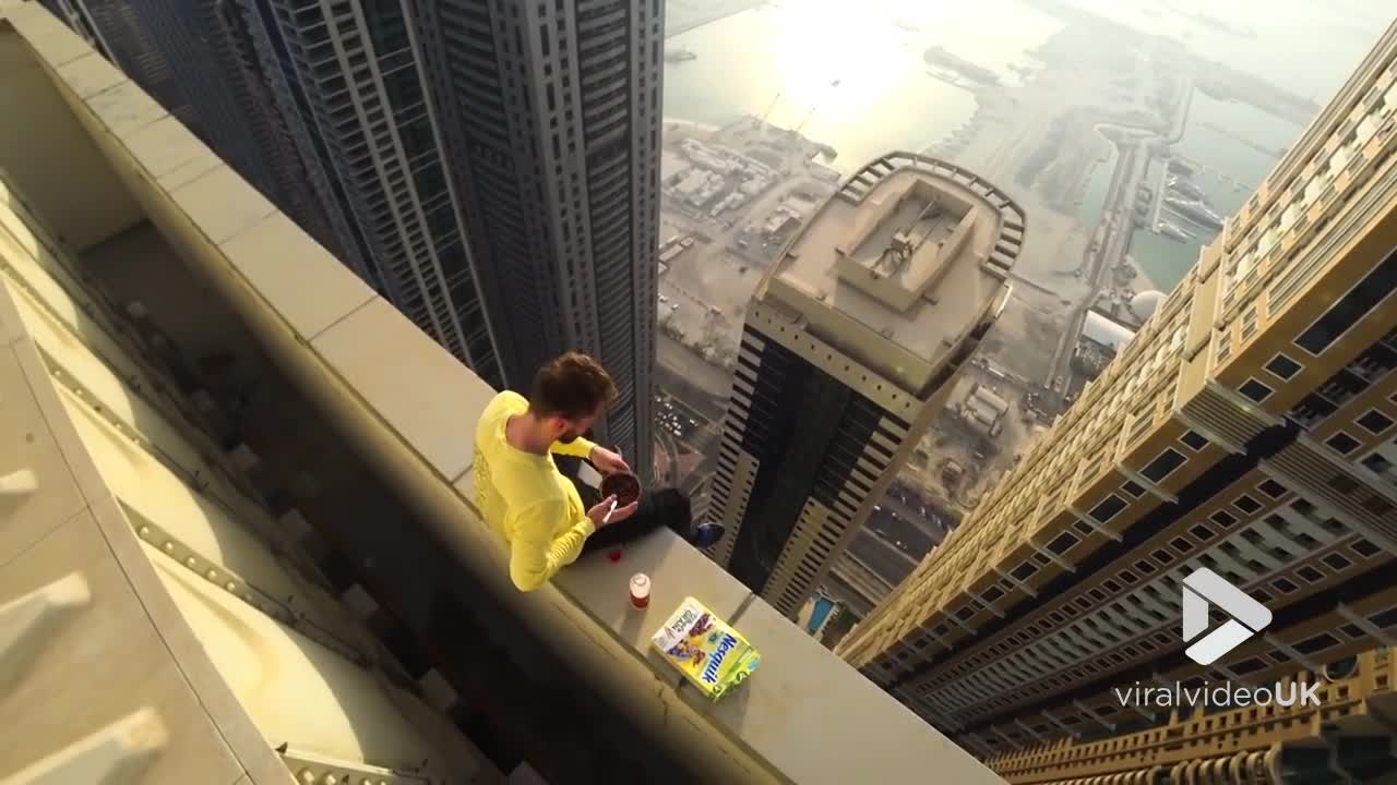 Having breakfast on the edge of Dubai tower