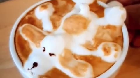 Cup Of Coffee With A Puppy Image Of Foam On Top