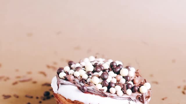 Sprinkling Toppings Over a Donut #shorts