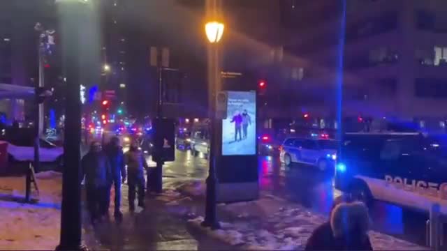 Quebec Canada - Police cars patrol the streets informing citizens to follow the covid curfews