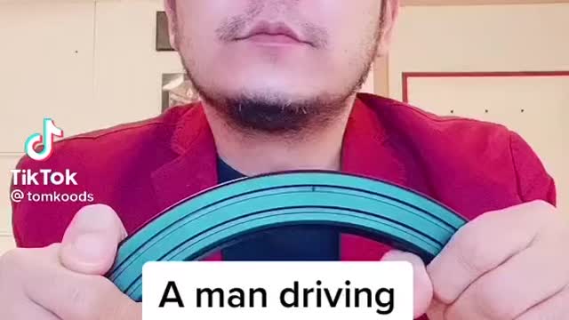 A man driving and vibing