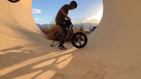 play bike in the pipe