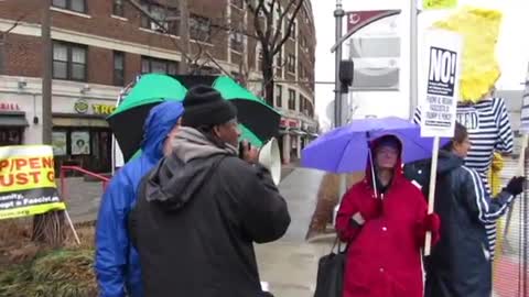 MAN INTERUPTS PROTEST THEN SINGS A SONG FOR THE CAMERA MAN