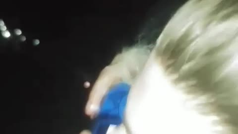 Night time rollercoaster beer shotgun