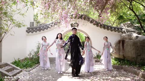 A great group dance of beautiful girls and a guy.