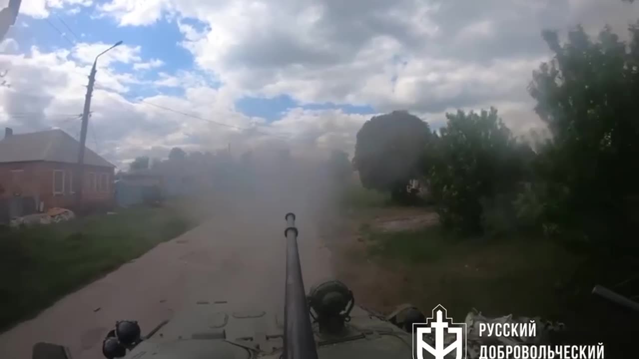 Russian Volunteer Corps (RDK) BTR-82 rolling near outskirts of the Volchansk town