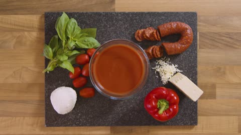 Top View Male Placing Ingredients Board on Worktop