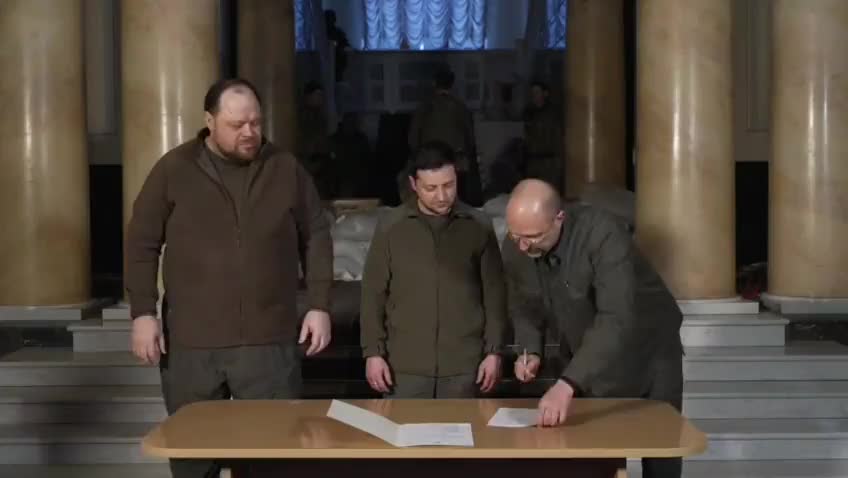 Ukraine's president Zelensky signs a fast-track EU